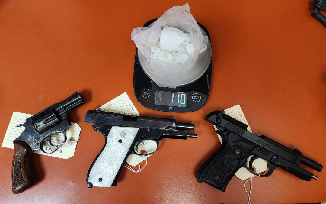 Guns, drugs recovered during traffic stop